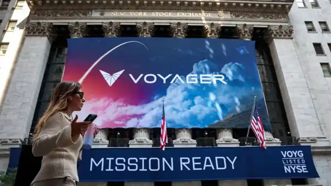 A Voyager Technologies banner hangs on the front of the New York Stock Exchange (NYSE) to celebrate the company’s IPOin New York City, U.S., June 11, 2025.